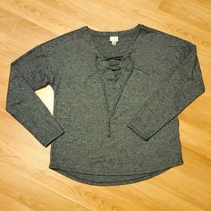 a New Day size medium long sleeve top.